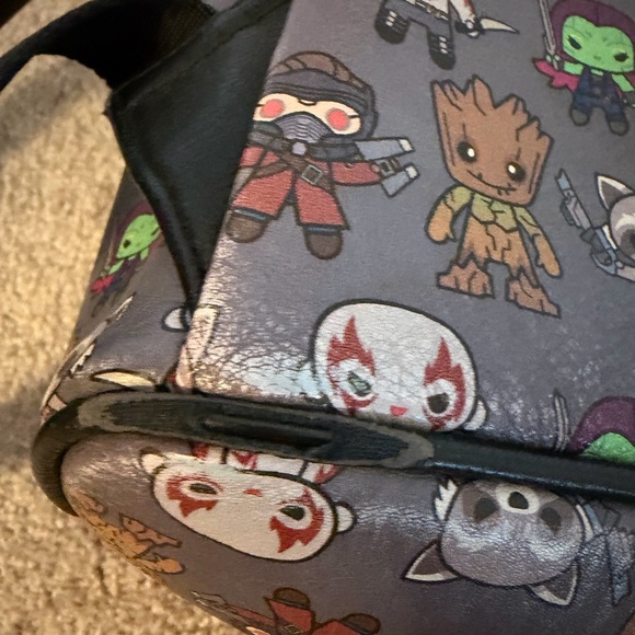 Loungefly Guardians Mini Backpack - Picture 9 of 9